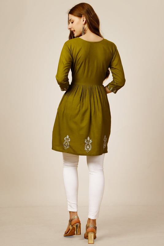 Radiant Mehendi Green Color Rayon Fabric Readymade Short Kurti