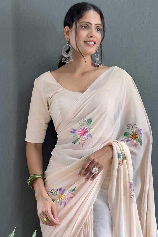 Appealing Floral Printed Georgette Saree In Cream Color