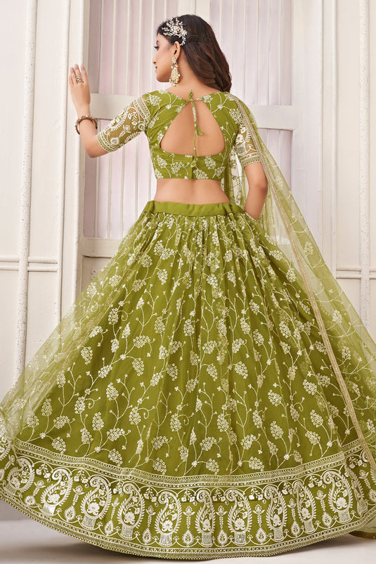 Engaging Green Color Net Fabric Embroidered Work Lehenga Choli