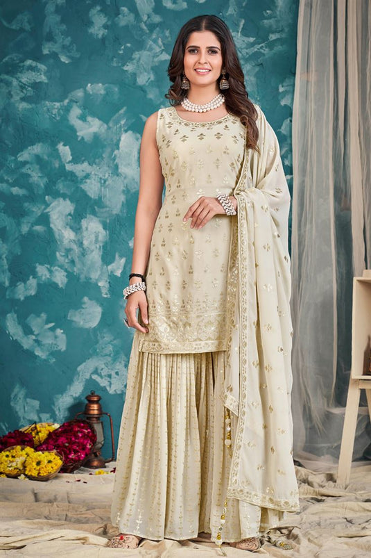 Komal Vora Tempting Georgette Cream Color Sharara Suit