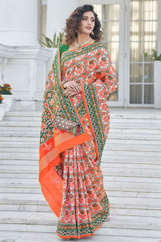 Patola Silk Fabric Orange Color Festive Look Engrossing Saree