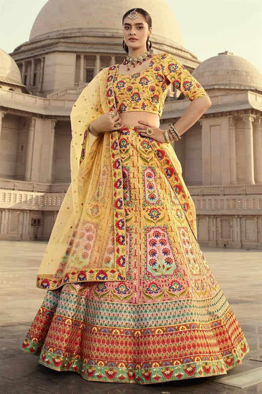 Art Silk Fabric Yellow Color Attractive Sangeet Wear Lehenga With Embroidered Work