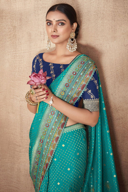 Attractive Cyan Color Weaving Work Silk Fabric Saree With Designer Blouse