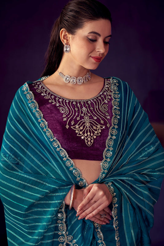 Attractive Stone Work Organza Fabric Saree In Teal Color