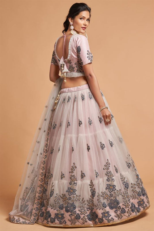 Sangeet Wear Net Fabric Patterned Peach Color Lehenga With Embroidered Work