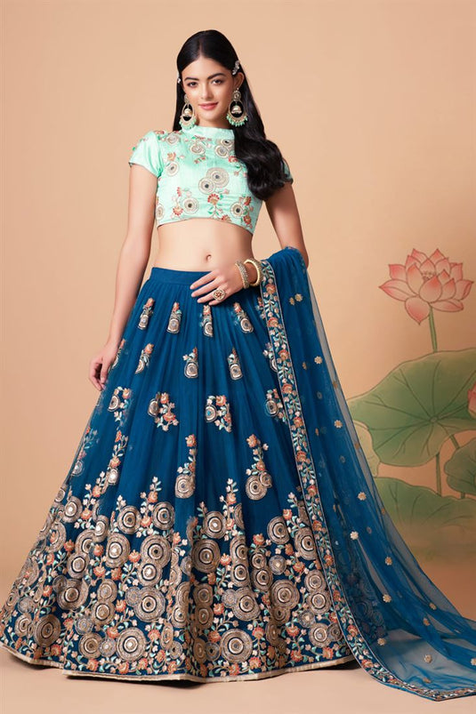 Radiant Sangeet Wear Blue Color Net Fabric Lehenga Choli