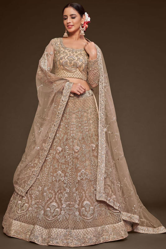 Net Fabric Beige Color Winsome Embroidered Work Lehenga