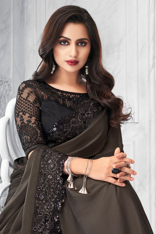 Charming Georgette Fabric Dark Beige Color Party Wear Saree With Embroidered Work