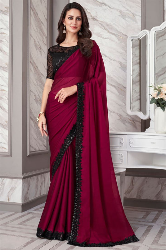 Larissa Bonesi Magenta Color Engaging Border Work Georgette Fabric Saree