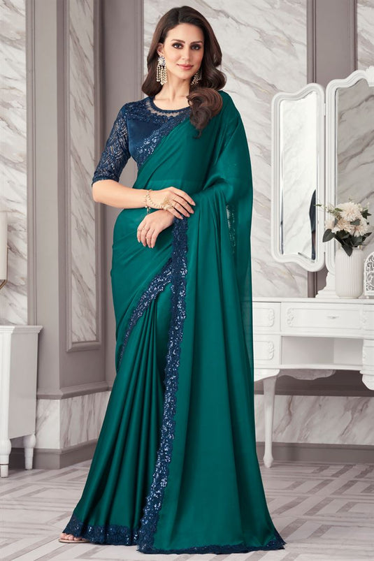 Larissa Bonesi Teal Color Awesome Border Work Georgette Fabric Saree