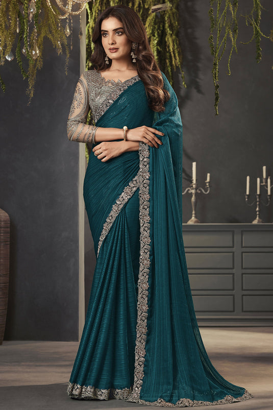 Lace Border Work Teal Color Fabulous Satin Fabric Saree With Embroidered Blouse