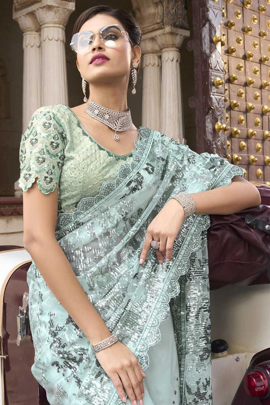 Engaging Sea Green Color Sequins Work Net Fabric Saree