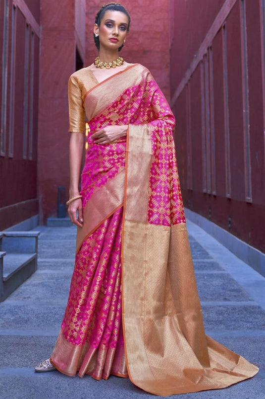 Puja Wear Patola Art Silk Fabric Trendy Weaving Work Saree In Magenta Color