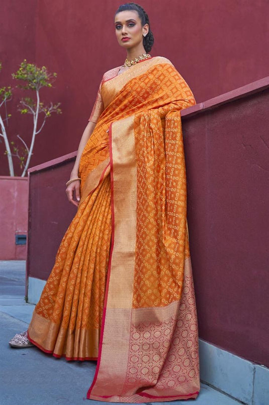 Patola Art Silk Fabric Trendy Puja Wear Orange Color Weaving Work Saree