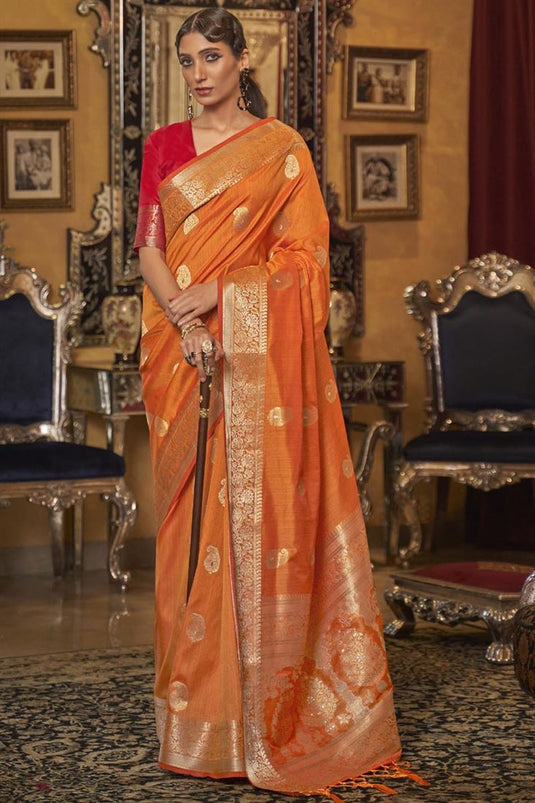 Festival Wear Art Silk Fabric Orange Color Weaving Work Mesmerizing Saree