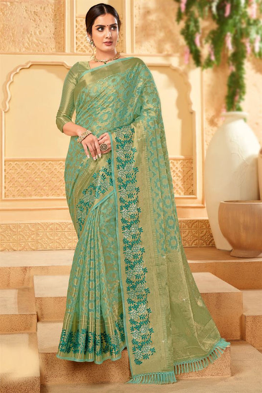 Creative Weaving Work On Organza Saree In Sea Green Color