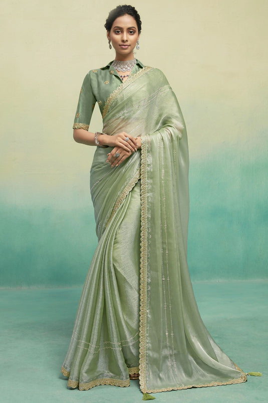 Function Wear Chiffon Fabric Lace Border Work Sea Green Color Saree With Embroidered Blouse