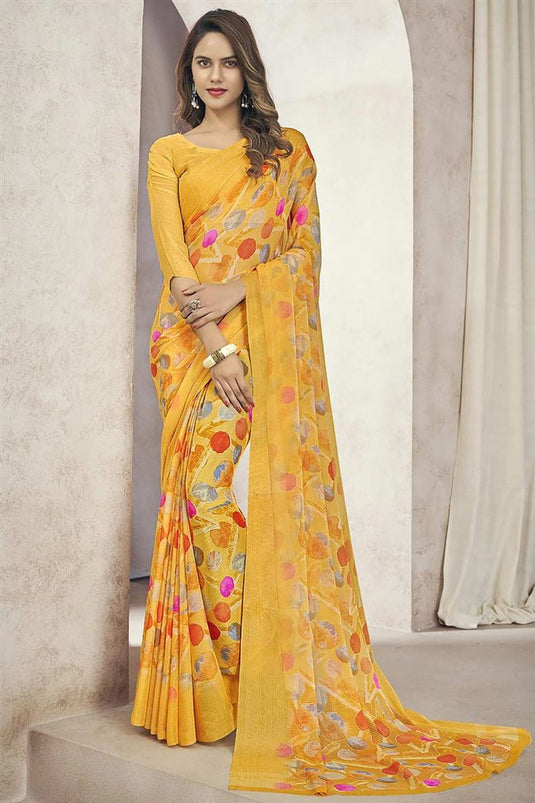 Chiffon Fabric Yellow Color Ingenious Casual Look Printed Saree