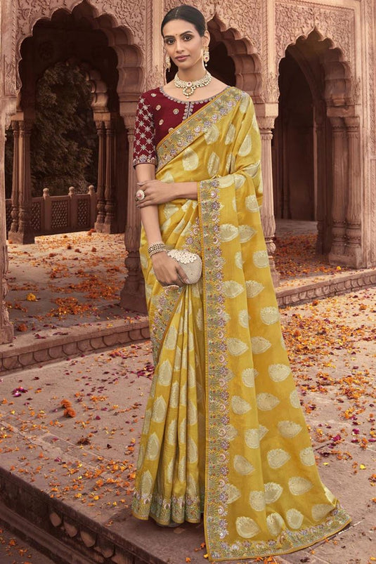 Tempting Yellow Color Tissue Silk Saree With Embroidered Work