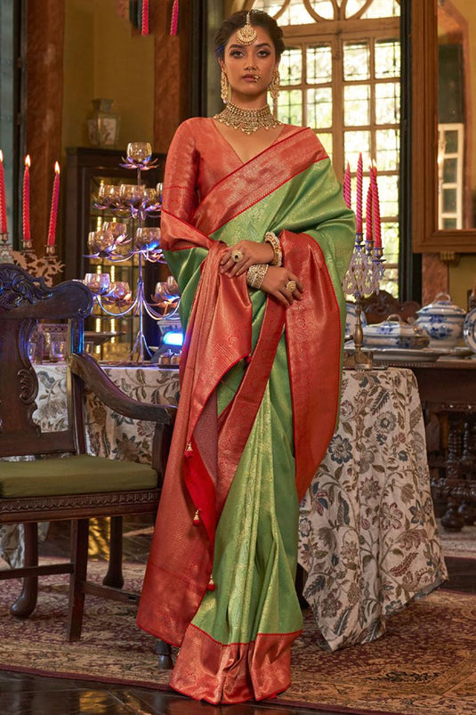 Embellished Weaving Work On Green Color Silk Fabric Saree