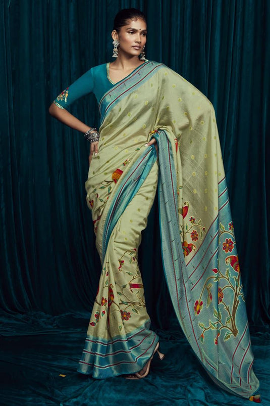 Brasso Silk Fabric Party Wear Printed Sea Green Color Saree With Embroidered Blouse