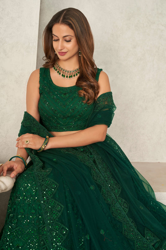 Dark Green Net Sequins Embroidered Wedding Wear Lehenga Choli