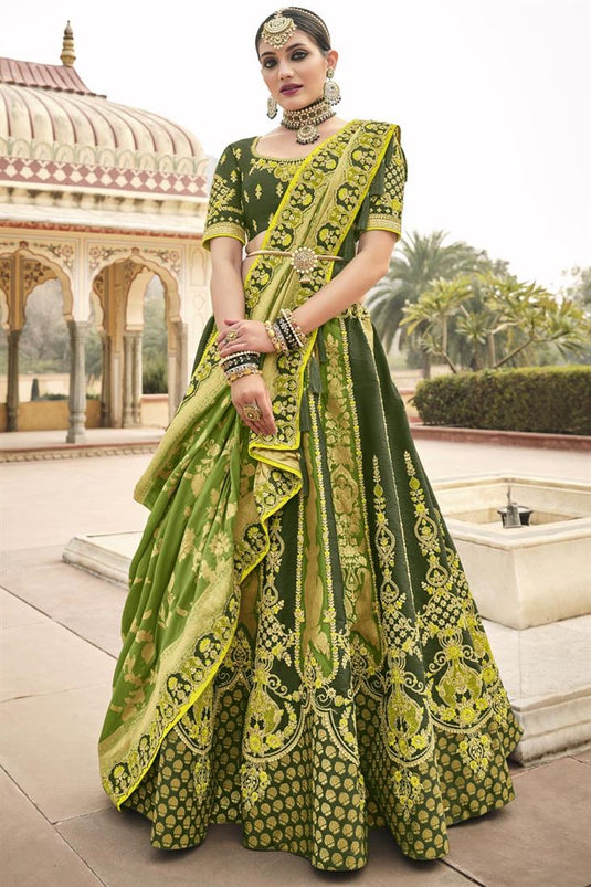 Graceful Silk Embroidered Lehenga Choli In Dark Green Color