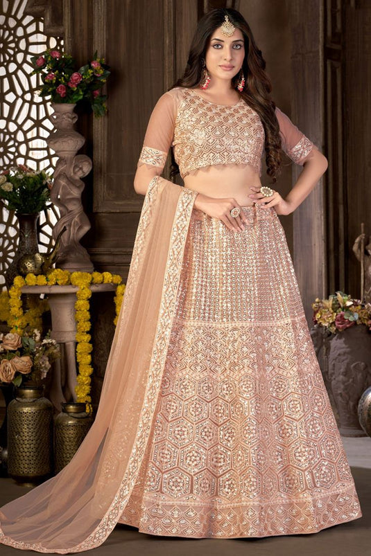 Peach Color Net Fabric Heavy Sequins Work Traditional Lehenga