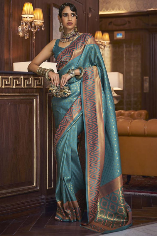 Cyan Color Weaving Work Art Silk Fabric Coveted Ikaat Style Saree