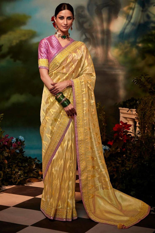 Art Silk Fabric Intriguing Fancy Work Saree In Yellow Color