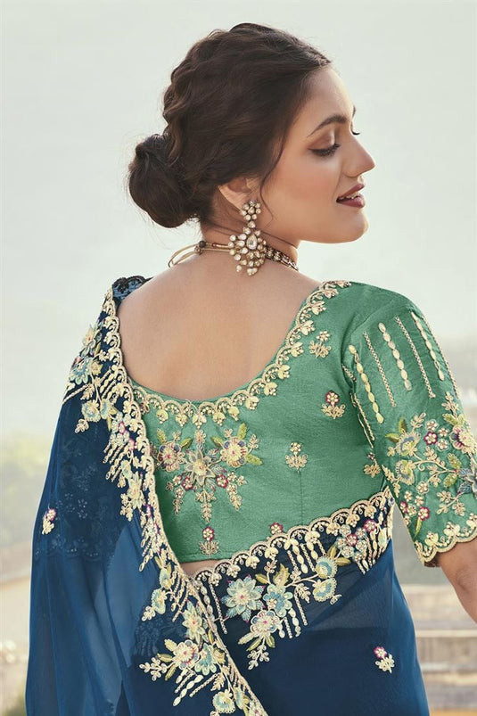 Function Wear Silk Fabric Teal Color Magnificent Embroidered Saree