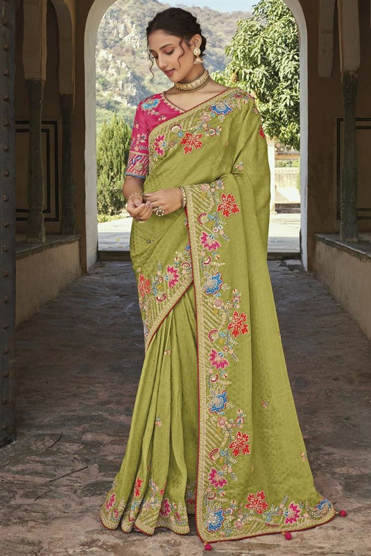 Silk Fabric Function Wear Mesmeric Embroidered Saree In Green Color