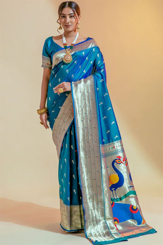 Riveting Weaving Work On Art Silk Fabric Saree In Cyan Color