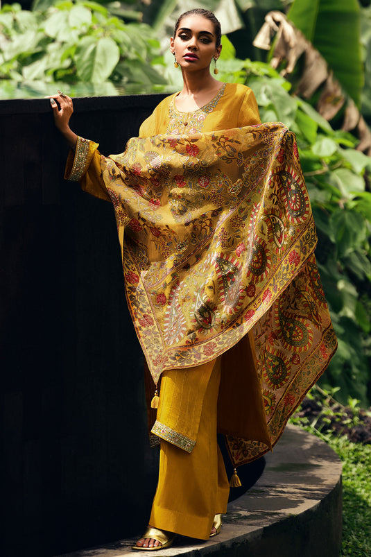 Charm Muslin Silk Embroidered Pakistani Salwar Kameez In Yellow Color