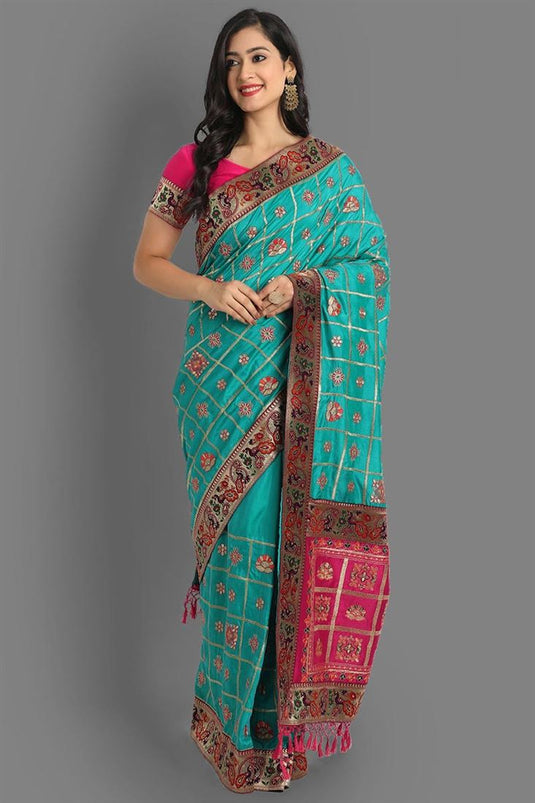 Festival Wear Art Silk Fabric Cyan Color Embroidered Work Sensational Patola Saree