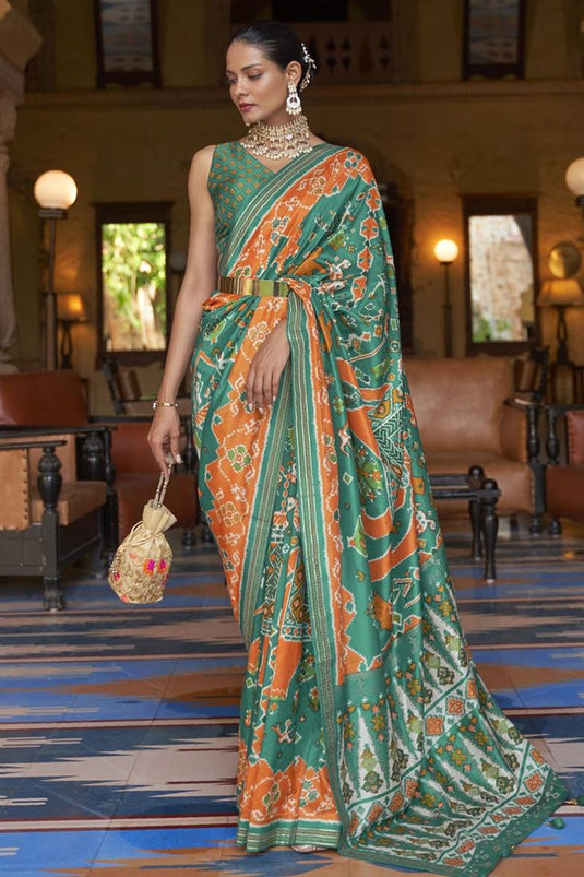 Fascinating Green Color Art Silk Fabric Patola Printed Saree