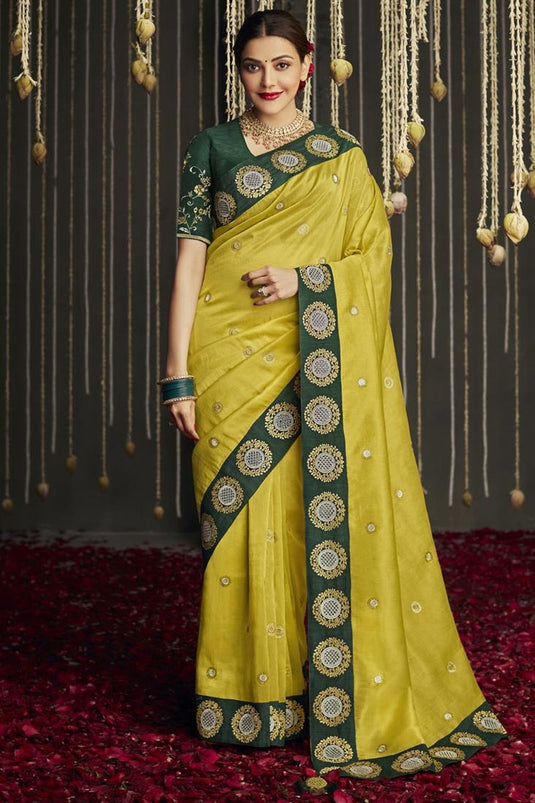 Classic Border Work On Yellow Color Kajal Aggarwal Saree In Crepe Fabric