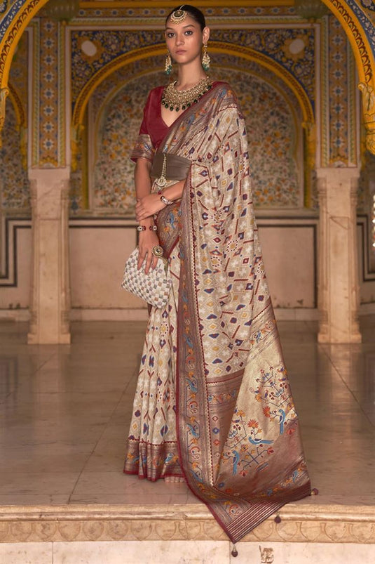 Patola Printed On Chikoo Color Adorning Saree In Art Silk Fabric