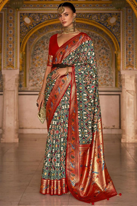 Art Silk Fabric Green Color Exceptional Patola Printed Saree