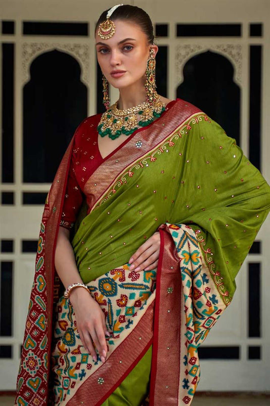 Patola Printed Flamboyant Art Silk Fabric Saree In Green Color