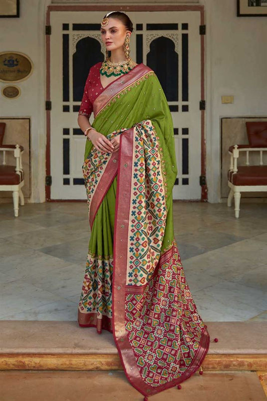 Patola Printed Flamboyant Art Silk Fabric Saree In Green Color