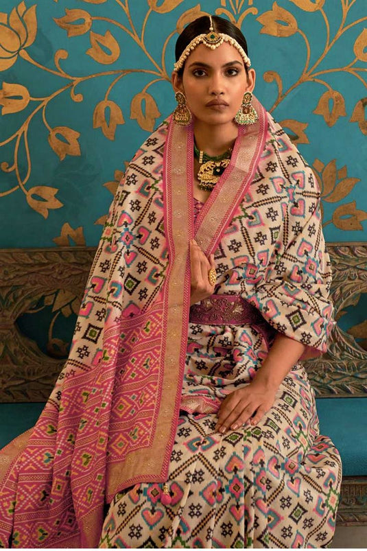 Winsome Patola Printed Work On Pink Color Art Silk Fabric Saree