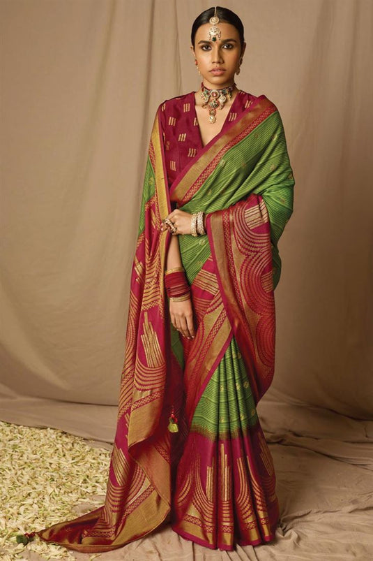 Engaging Green Color Brasso Fabric Saree With Weaving Work