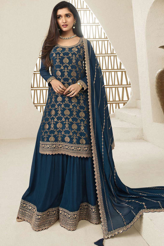 Nidhi Shah Function Wear Navy Blue Color Embroidered Palazzo Suit In Chinon Jacquard Fabric