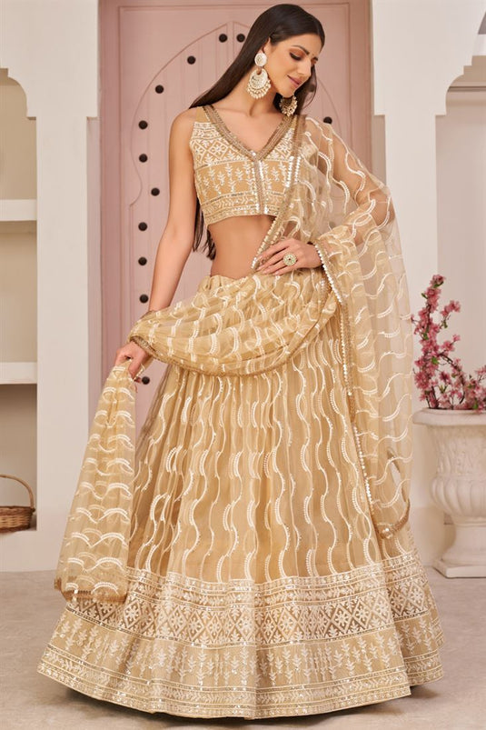 Sangeet Wear Captivating Net Lehenga In Beige Color