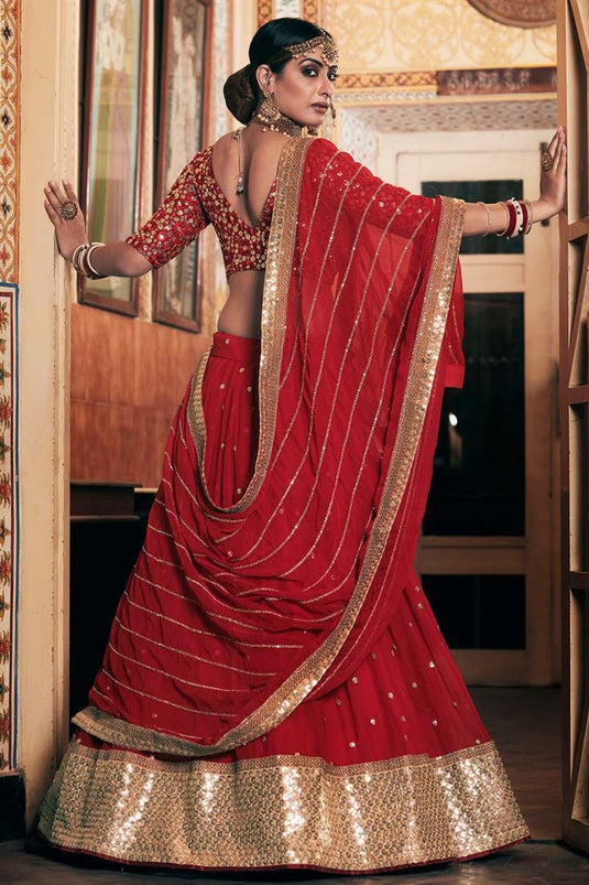 Red Color Sangeet Wear Splendid Embroidered Work Lehenga In Georgette Fabric