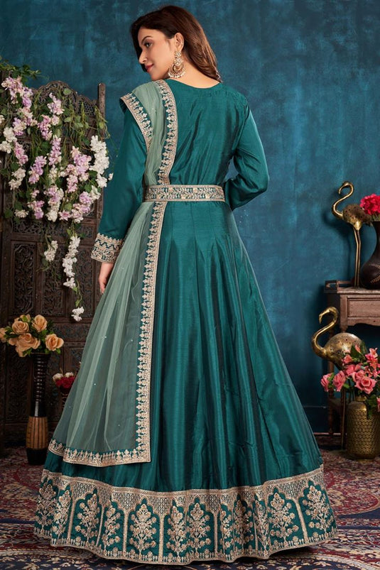 Sangeet Wear Art Sirk Fabric Teal Color Embroidered Anarkali Suit With Net Dupatta