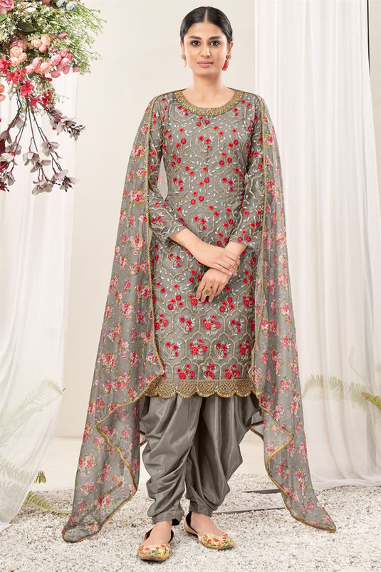 Alluring Net Fabric Grey Color Embroidered Patiala Suit