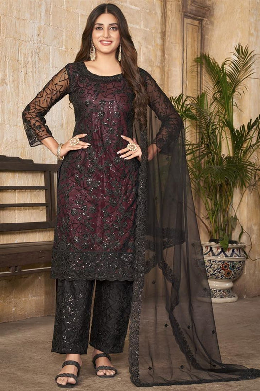 Soothing Net Fabric Embroidered Salwar Suit In Maroon Color