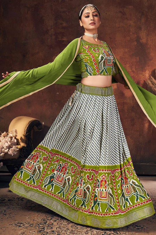 Digital Patola Printed Work On Mehendi Green Color Art Silk Fabric Sangeet Wear Phenomenal Lehenga